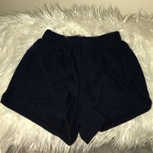 short navy blue soffe shorts.